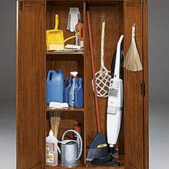 Open pantry cabinet with shelves and middle patition